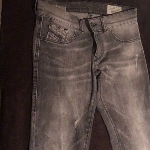 Distressed gray diesel jeans. Made in Italy